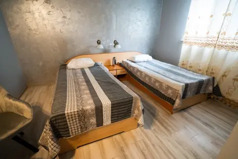 Cameră cu două paturi de o persoană